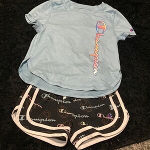 Champion Light Blue Short Sleeve Tee with Black Shorts